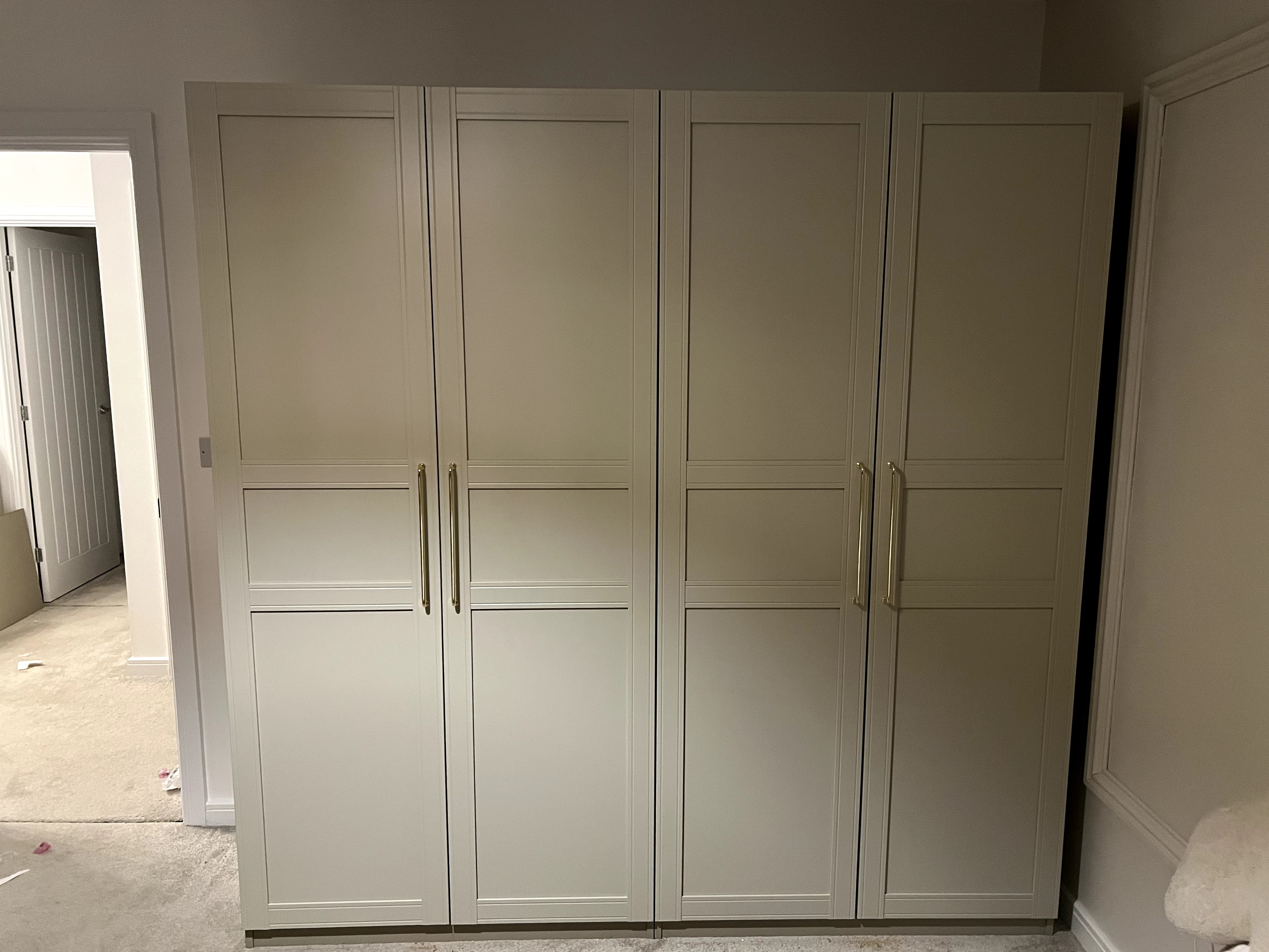 Modern bunk bed with integrated full-height wardrobe unit assembled