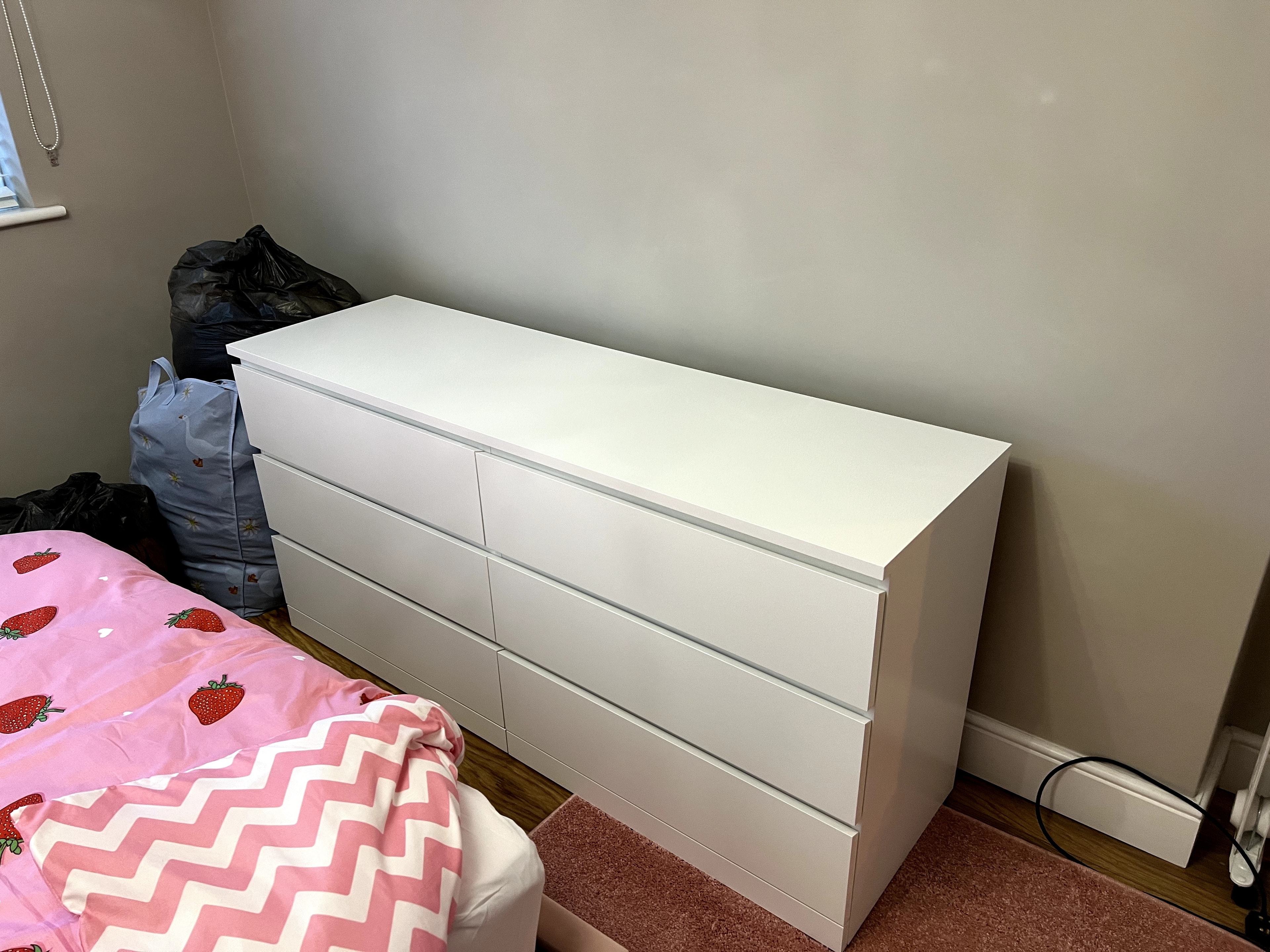 White 6-drawer chest of drawers assembled in bedroom