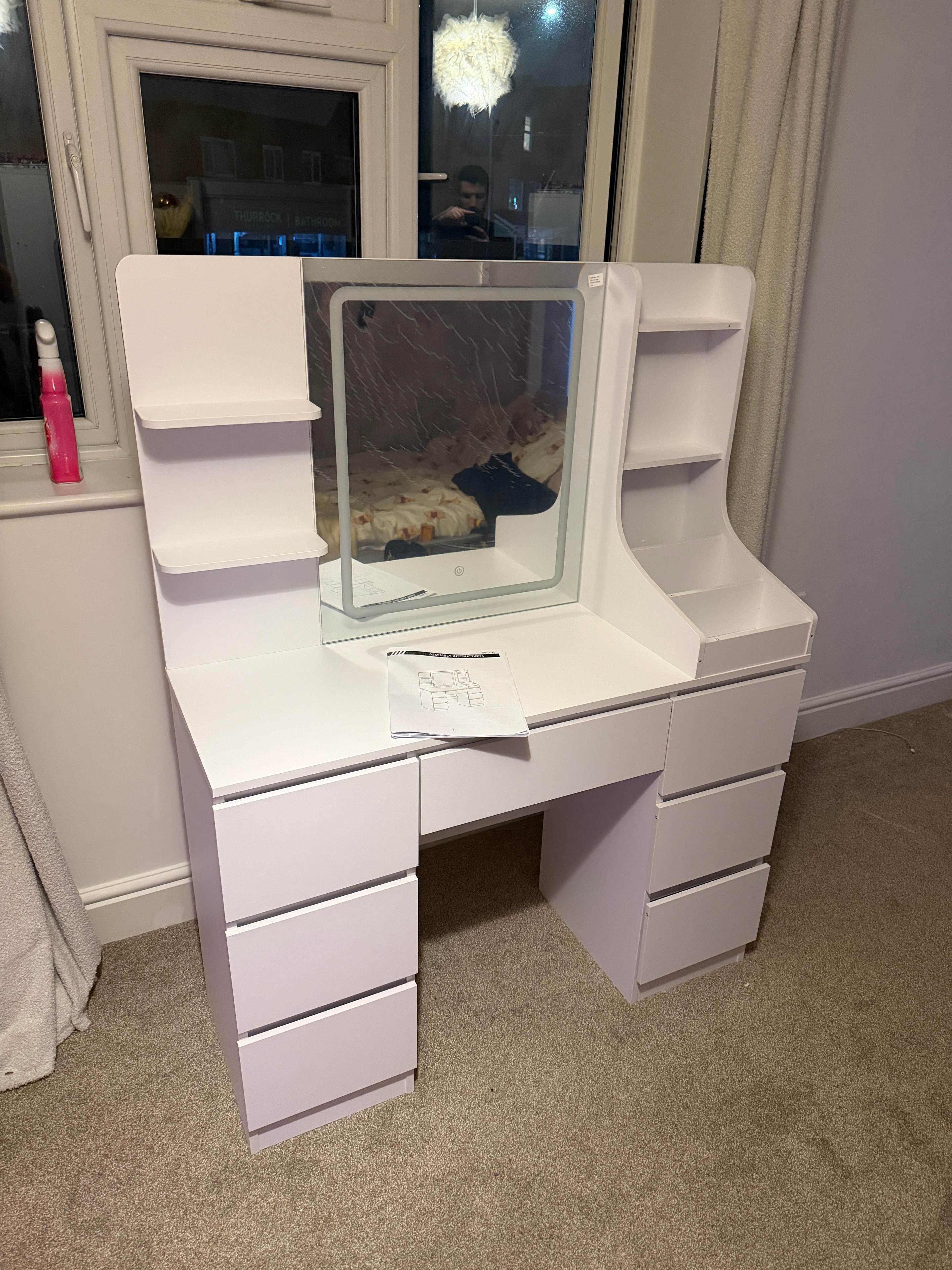 White dressing table with illuminated mirror and storage assembled