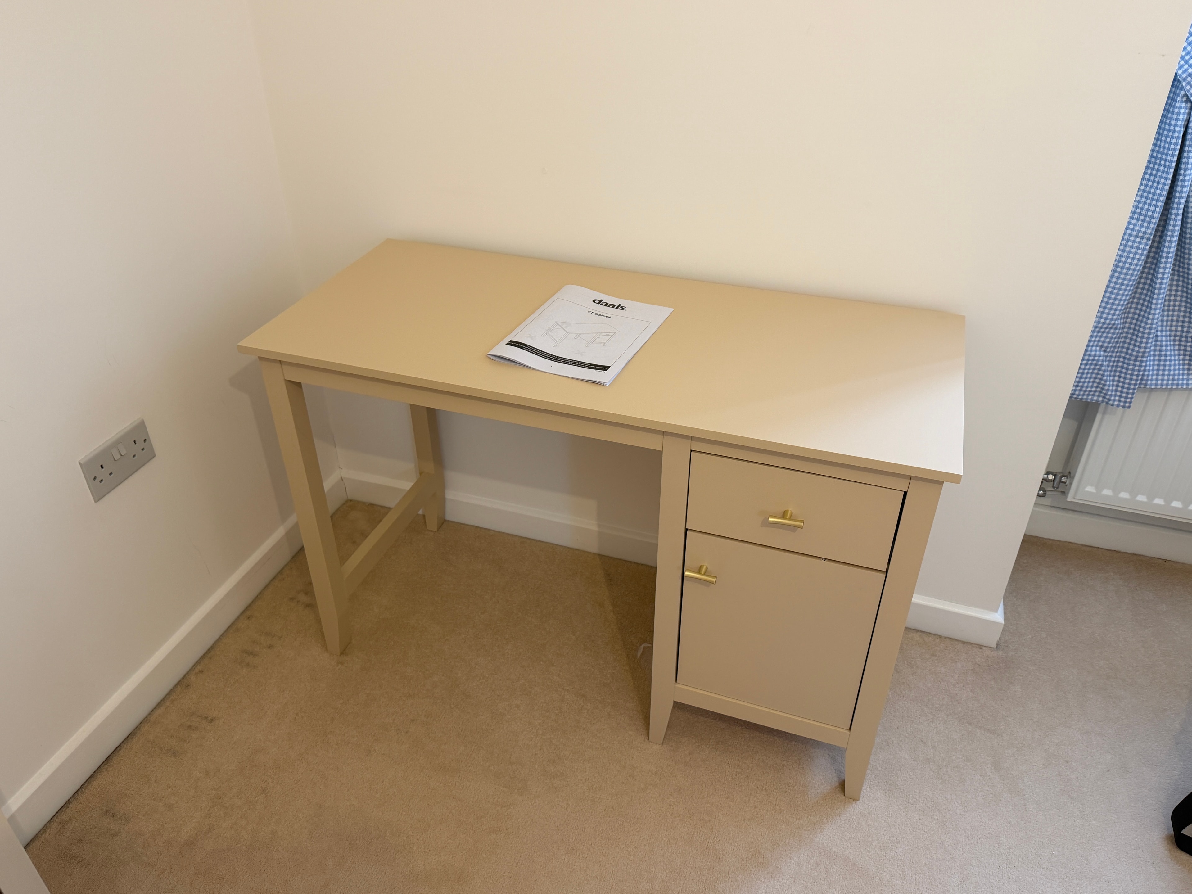 Tan wooden desk with drawer and cupboard pedestal assembled